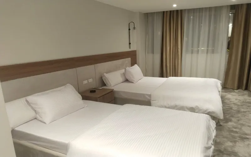 غرفة-بسريرين-مفردين-–-فندق-سكن-مدينة-نصر.webp